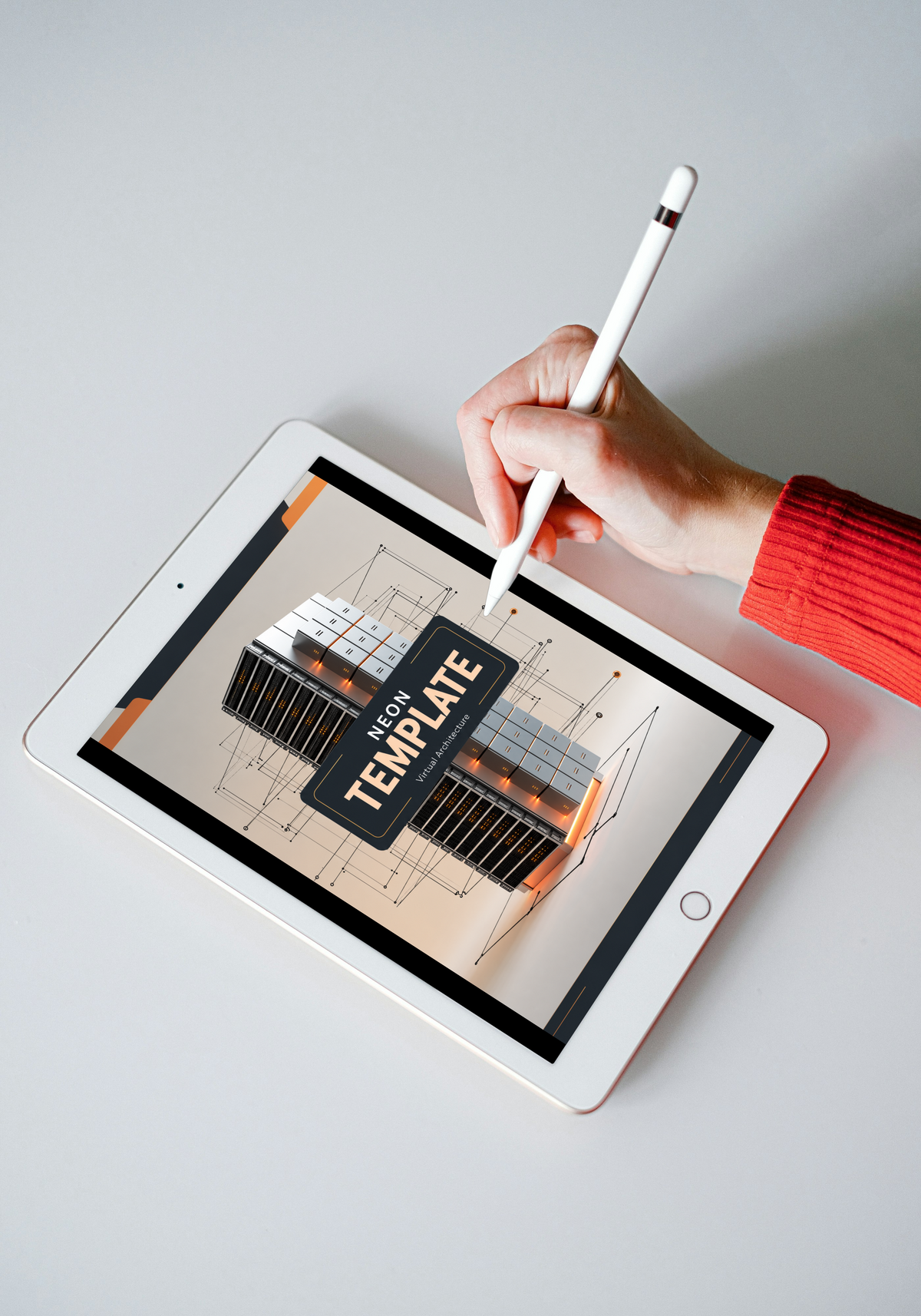 A hand in a red sweater holds a white stylus above a tablet showing a 3D architectural model template, photographed on a light gray surface.